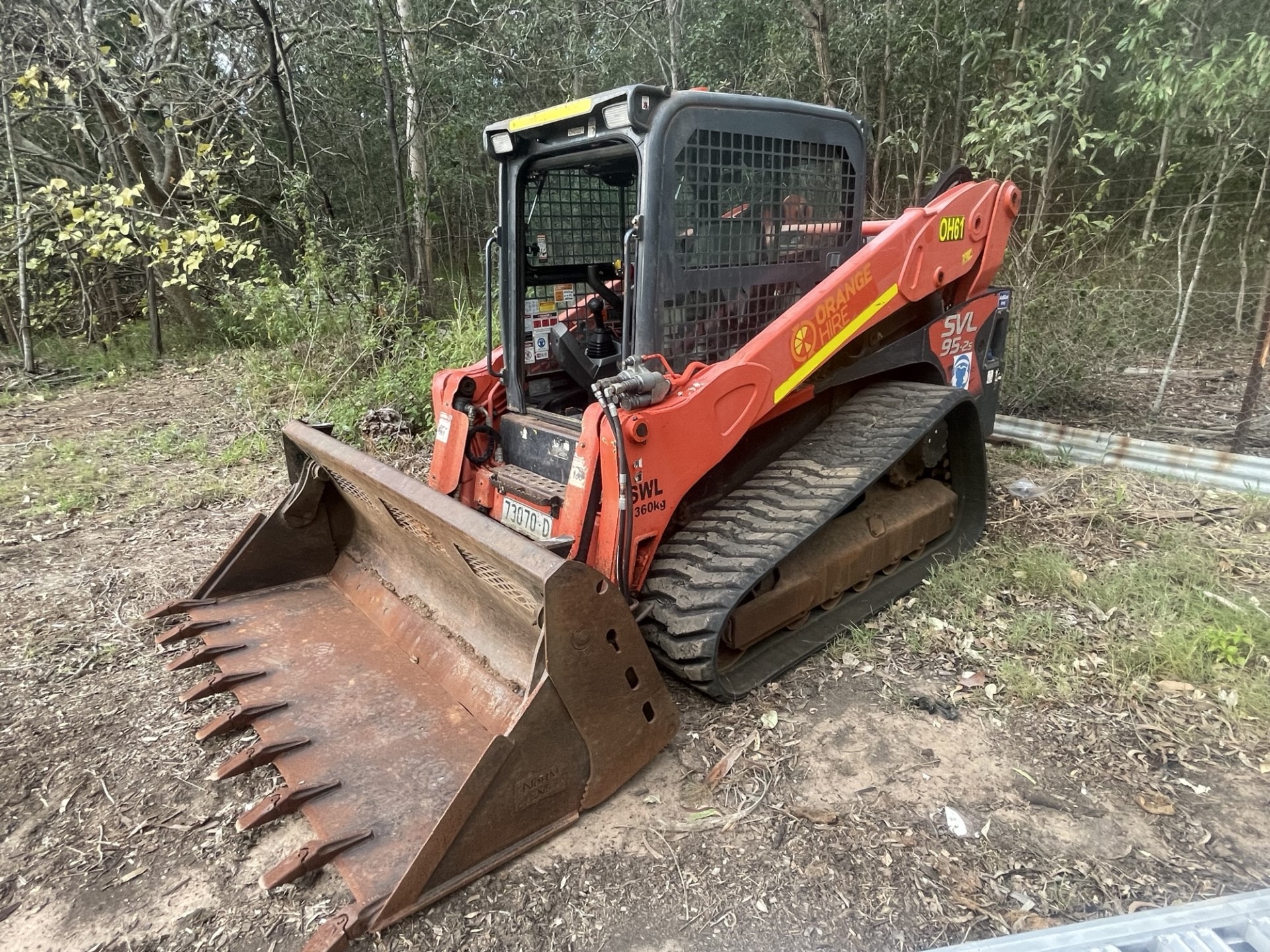 A skid steer in action, provided by Dynamic Tree Solutions - Your go-to for reliable and efficient skid steer services.